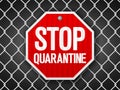 Stop quarantine sign on wire fence Royalty Free Stock Photo