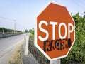 Stop racism road sign in the coutryside