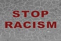 STOP RACISM text cracked red paint on a metal surface Royalty Free Stock Photo