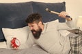 Stop ringing. bearded man hipster want to sleep. hate noise of alarm clock. Stages of sleep. Man awake unhappy with