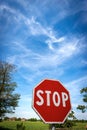 Stop Road Sign on Blue sky with Clouds - Rural Scene Photography Royalty Free Stock Photo