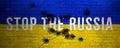 Stop the Russia text banner background. Bullets shots against Ukrainian flag, cracked and damaged brick wall image