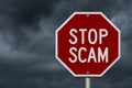 Stop Scam red road sign Royalty Free Stock Photo