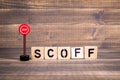 Stop Scoff concept. Wooden letters with road sign Royalty Free Stock Photo