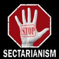 Open hand with the text stop sectarianism. Global social problem Royalty Free Stock Photo