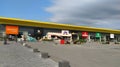 Stop shop shopping center, Sremska Mitrovica, Serbia, June 06, 2022. Square with open shops dm, intersport, dekordom