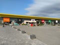 Stop shop shopping center, Sremska Mitrovica, Serbia, June 06, 2022. Square with open shops dm, intersport, dekordom