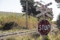 Stop sign at an abandoned level crossing