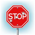 Stop sign with bullet holes Royalty Free Stock Photo