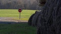 Stop sign on country road Royalty Free Stock Photo