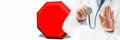 Stop sign and doctor hand doing prohibition sign. Doctor warning about diseases. Health care. Royalty Free Stock Photo