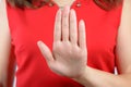 stop sign of female hand on the background of dress Royalty Free Stock Photo