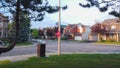 Stop sign on a pole in the street in the Barrhaven suburb of Ottawa, Canada.