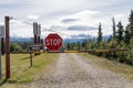 Stop sign prevents trespassers from getting closer to the pipeline. Trans-Alaskan Pipeline viewpoint from the RIchardson Highway Royalty Free Stock Photo