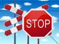 Stop sign at railway crossing and blue sky