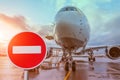 Stop sign red circle brick and blocked plane. Fly ban concept Royalty Free Stock Photo