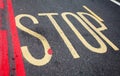 Stop sign road marking in London Royalty Free Stock Photo