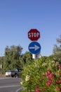 Stop sign on the road. Stop sign on the prairie. Road junction, stop word Royalty Free Stock Photo