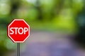 Stop sign traffic signs,Red Stop sign on blue green nature background