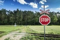 Stop Sign on Unguarded Rail Road.