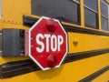 stop sign on yellow school bus Royalty Free Stock Photo