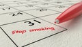 Stop smoking calendar entry pen on paper