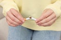 Stop smoking concept. Woman breaking cigarette, closeup Royalty Free Stock Photo