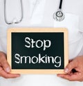 Stop Smoking - Doctor with chalkboard Royalty Free Stock Photo