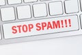 Stop spam concept on keyboard button. Close up Royalty Free Stock Photo