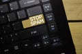 Stop Spam write on keyboard isolated on laptop background