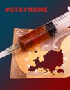 Stop the spread of the Coronavirus, stay home. Syringe with against Covid 19 vaccine and a fifty euro banknote