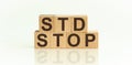 STOP STD Sexually transmitted infections text on wooden cubes. Medical concept Royalty Free Stock Photo