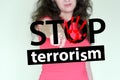 Stop terrorism concept. girl in red Royalty Free Stock Photo