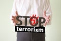 Stop terrorism concept. man holds