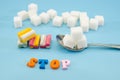 Stop text colored letters. The concept of offering diets and eating less sugar for health. Sugar harm concept. Gum has a lot of su