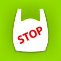Stop text red on the plastic handle bags isolated on green background, bag plastic symbol for pollution problem concept for reduce