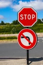 Stop traffic sign no left turn. Traffic restriction Against the background of the road and the bright sky Royalty Free Stock Photo