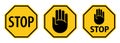 Stop traffic signs with hand palm symbol yellow black Royalty Free Stock Photo