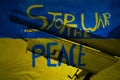 Stop the war peace painting on wall ukraine flag with cannon