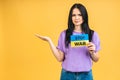 Stop war in Ukraine! Portrait of sad agressive angry woman holding in hands Ukrainian flag Royalty Free Stock Photo