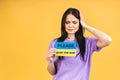 Stop war in Ukraine! Portrait of sad agressive angry woman holding in hands Ukrainian flag Royalty Free Stock Photo