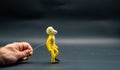 Stopmotion process of walking. Second step. Man\'s hand holding with an aluminum wire a figure made