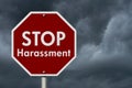 Stopping harassment Stop Sign with stormy clouds Royalty Free Stock Photo