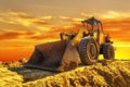 Yellow excavator at an incredibly beautiful sunset