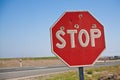 Stopsign with bullet hole