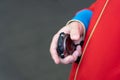 Stopwatch timer a in man s hand. Man`s hand with a stopwatch Royalty Free Stock Photo