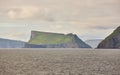 Stora Dimun dramatic island in Faroe archipelago. Atlantic ocean