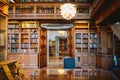 Storage of books. Large old library in the Gothic style. Shelves and rows with books. City Library at the City Hall of Denmark