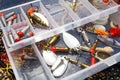 Storage box with fishing baits and accessories Royalty Free Stock Photo