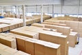 Storage of cardboard boxes in a large warehouse of an industrial Royalty Free Stock Photo